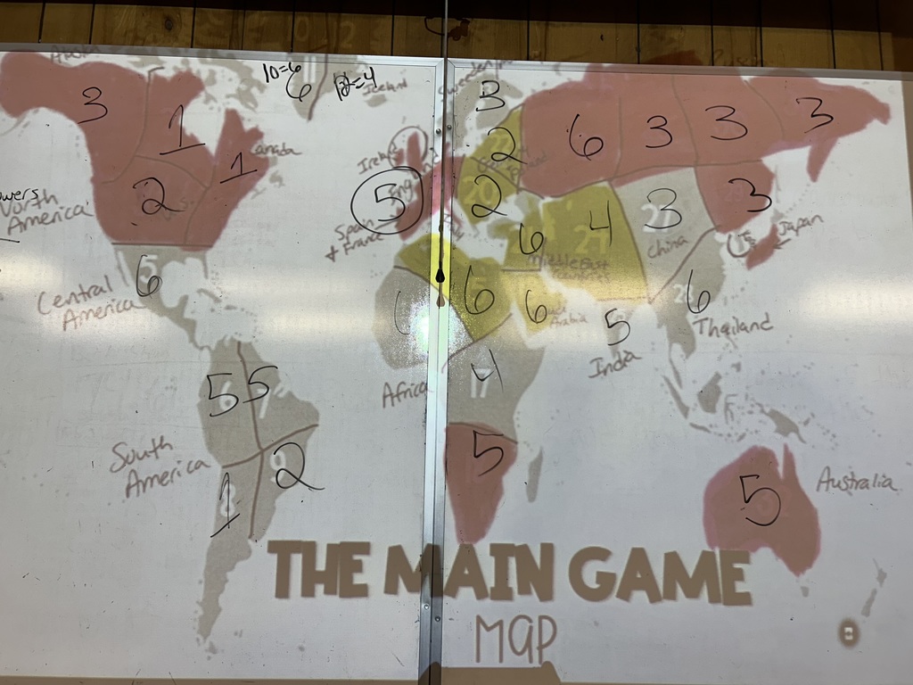 As a culminating activity for the study of imperialism and nationalism—and an introduction to World War I—World History students participated in the MAIN Game. MAIN represents Militarism, Alliances, Imperialism, and Nationalism, the four major tensions that contributed to the outbreak of WWI. Students used resource cards (gold, diamonds, wheat, and oil) to purchase tactical cards representing military strength, territory, alliances, and industry. Through strategic decision-making, students formed alliances or waged war with other countries to gain territory by playing cards and rolling dice. The objective was to acquire as much territory as possible, helping students experience firsthand how competition, resources, and power struggles fueled global conflict leading up to World War I.