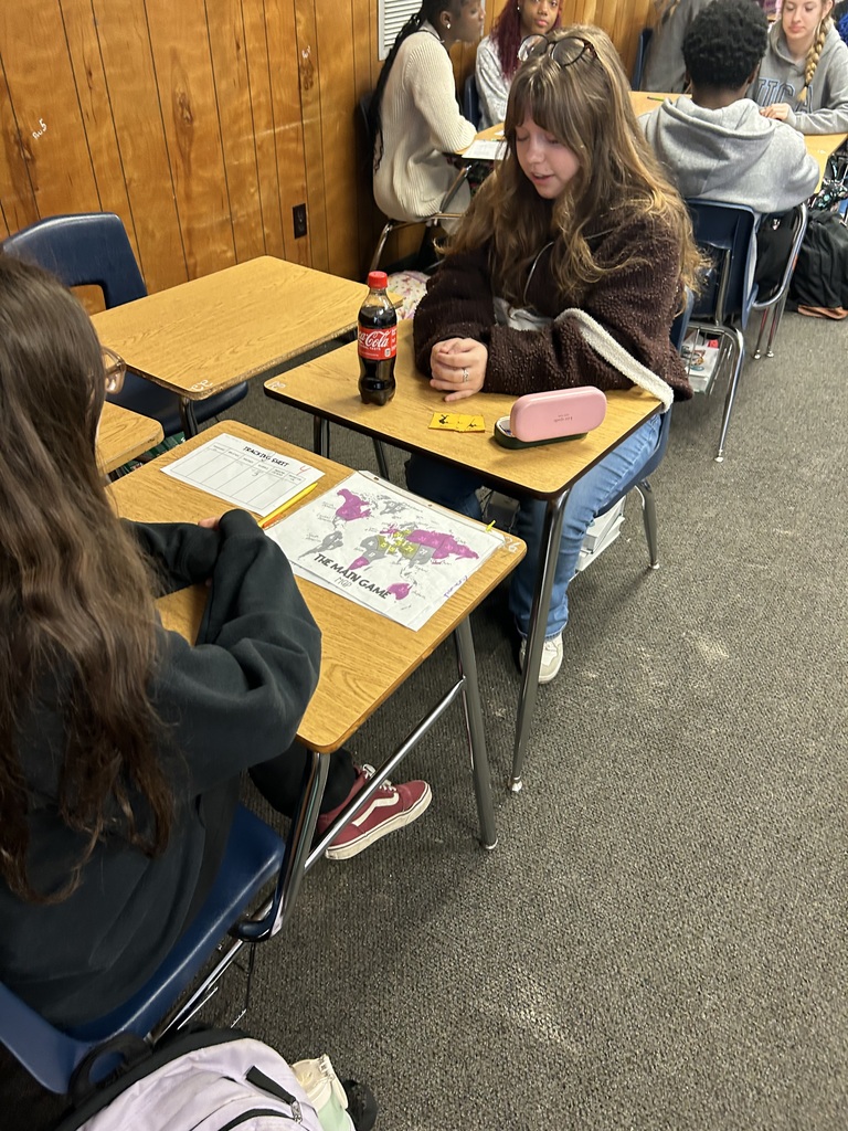 As a culminating activity for the study of imperialism and nationalism—and an introduction to World War I—World History students participated in the MAIN Game. MAIN represents Militarism, Alliances, Imperialism, and Nationalism, the four major tensions that contributed to the outbreak of WWI. Students used resource cards (gold, diamonds, wheat, and oil) to purchase tactical cards representing military strength, territory, alliances, and industry. Through strategic decision-making, students formed alliances or waged war with other countries to gain territory by playing cards and rolling dice. The objective was to acquire as much territory as possible, helping students experience firsthand how competition, resources, and power struggles fueled global conflict leading up to World War I.