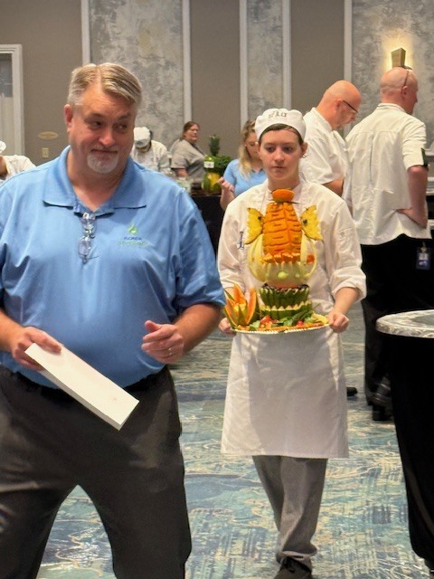 We are so proud of Selia for representing Ridgeview High School this past weekend in Orlando at the ProStart competition, where she competed in the Decorative Food Centerpiece category. This event required creativity, precision, and composure as students designed and carved intricate edible centerpieces under timed, competitive conditions. Selia’s focus, attention to detail, and artistic skill were on full display, and she represented our culinary program and Panther community with professionalism and pride. Opportunities like this showcase the incredible talent and real-world skills our students are developing, and we are so proud of Selia’s hard work and dedication.