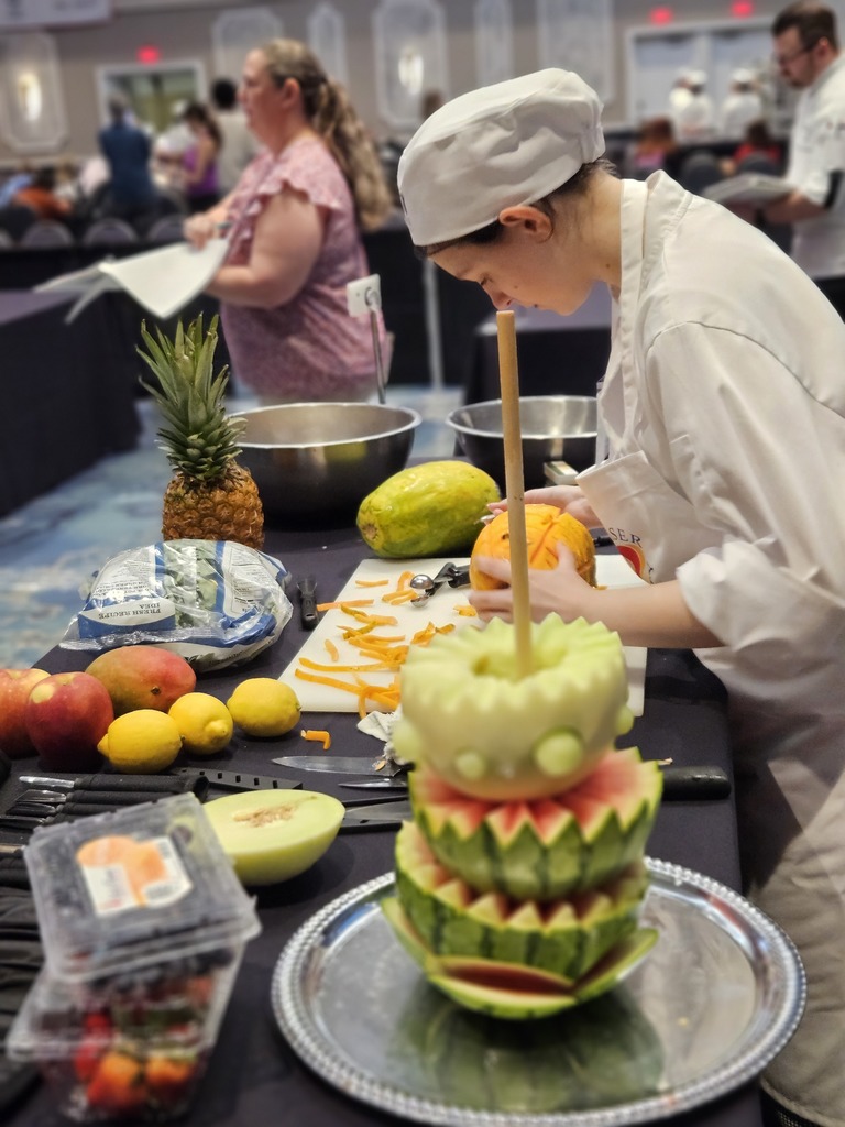 We are so proud of Selia for representing Ridgeview High School this past weekend in Orlando at the ProStart competition, where she competed in the Decorative Food Centerpiece category. This event required creativity, precision, and composure as students designed and carved intricate edible centerpieces under timed, competitive conditions. Selia’s focus, attention to detail, and artistic skill were on full display, and she represented our culinary program and Panther community with professionalism and pride. Opportunities like this showcase the incredible talent and real-world skills our students are developing, and we are so proud of Selia’s hard work and dedication.