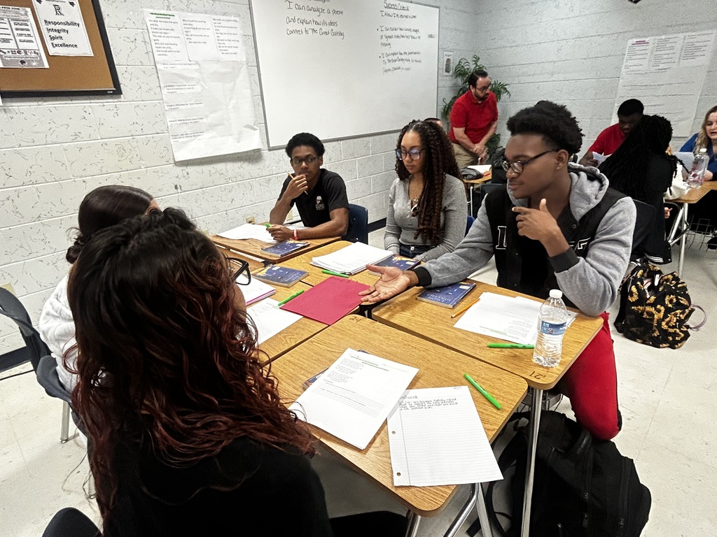 Students in Ms. Michaels and Mr. Gonzalez’s classes were deeply engaged as they worked collaboratively to analyze four different poems while making intentional connections to The Great Gatsby. From the start, each group examined how the poems reflected Fitzgerald’s themes of wealth, illusion, perception, tragedy, and the human desire for more. Students took ownership of their texts, closely analyzing words, imagery, tone, and symbolism to uncover deeper meaning. Through shared annotation and purposeful discussion, they supported their ideas with clear textual evidence, referenced characters and events from the novel, and engaged in strong academic dialogue. This is what student-centered instruction looks like — students doing the cognitive work, thinking critically, and making powerful cross-text connections.