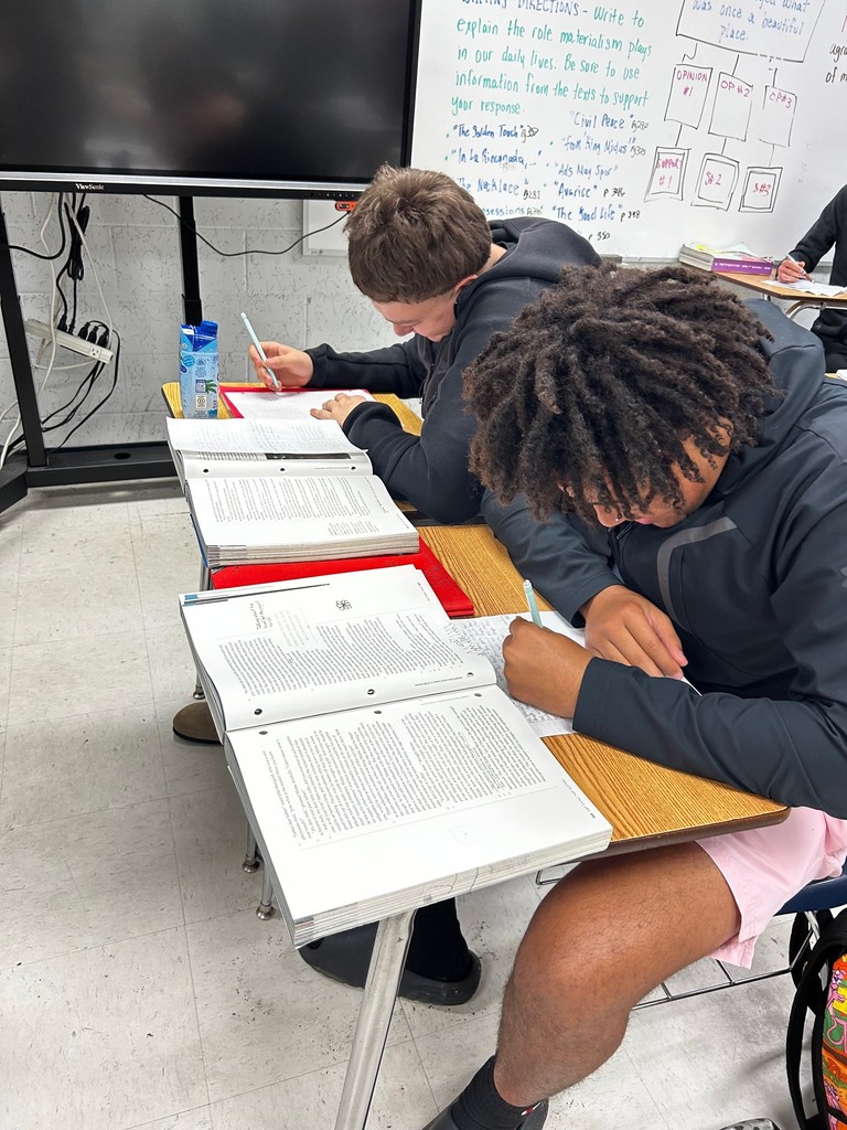 Ms. Eaton’s 10th-grade English students strengthened their writing skills by explaining the role of materialism in their daily lives. Using a paragraph ladder strategy, students broke down the structure of a strong body paragraph by identifying their opinion, explaining their thinking, supporting it with textual evidence, and tying their ideas back to their overall claim. With guidance from the writing notes and the model displayed on the board, students pulled evidence from multiple texts, such as “The Golden Touch,” “The Necklace,” and “Avarice,” to build thoughtful, well-supported arguments. Through planning, organizing ideas, and selecting meaningful quotes, students strengthened their analytical writing while learning to support their claims with clear evidence.