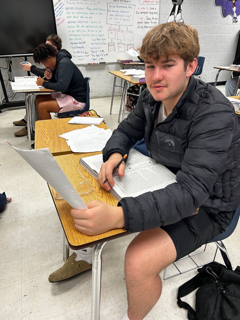 Ms. Eaton’s 10th-grade English students strengthened their writing skills by explaining the role of materialism in their daily lives. Using a paragraph ladder strategy, students broke down the structure of a strong body paragraph by identifying their opinion, explaining their thinking, supporting it with textual evidence, and tying their ideas back to their overall claim. With guidance from the writing notes and the model displayed on the board, students pulled evidence from multiple texts, such as “The Golden Touch,” “The Necklace,” and “Avarice,” to build thoughtful, well-supported arguments. Through planning, organizing ideas, and selecting meaningful quotes, students strengthened their analytical writing while learning to support their claims with clear evidence.