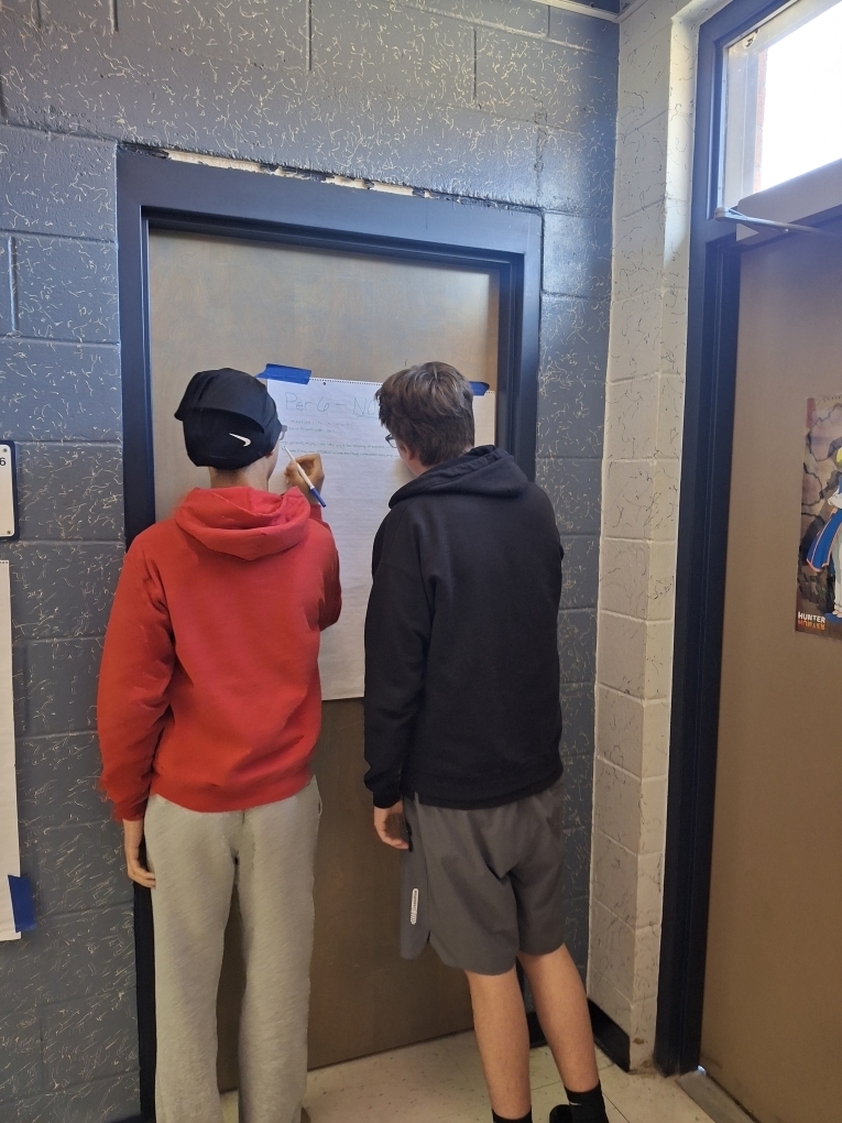 Students in Ms. Dupont’s 9th-grade English class recently brought Romeo and Juliet to life through thoughtful discussion and debate. As they prepared to write their argumentative essays, students began by creating their own personal definitions of love before gathering textual evidence to support two perspectives: whether Romeo and Juliet shared true love or their relationship was not authentic. Using color-coded index cards, students recorded quotes and explanations for both sides, then worked with a partner to debate the strength of each argument. After reaching a consensus, pairs selected a quote and explanation to display on poster paper for their classmates to review. This engaging activity helped students strengthen their critical thinking, collaboration, and evidence-based writing skills.