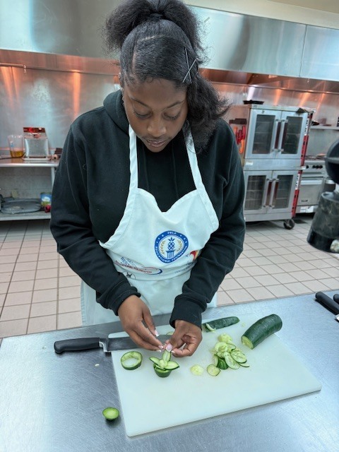 Students in Culinary 3 and 4 are sharpening their culinary artistry while learning garnishing and decorative food presentation. As part of the lesson, students practiced transforming cucumbers into delicate flower designs, building both knife skills and attention to detail. Activities like this help our Panthers understand that presentation is just as important as flavor in the culinary world while allowing them to showcase their creativity in the kitchen.