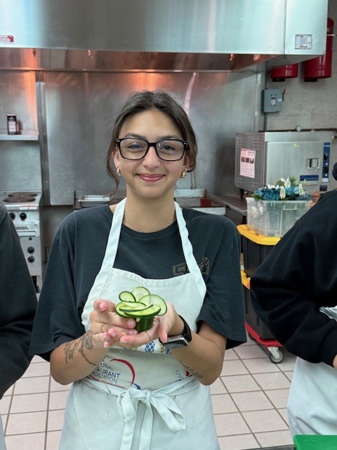 Students in Culinary 3 and 4 are sharpening their culinary artistry while learning garnishing and decorative food presentation. As part of the lesson, students practiced transforming cucumbers into delicate flower designs, building both knife skills and attention to detail. Activities like this help our Panthers understand that presentation is just as important as flavor in the culinary world while allowing them to showcase their creativity in the kitchen.