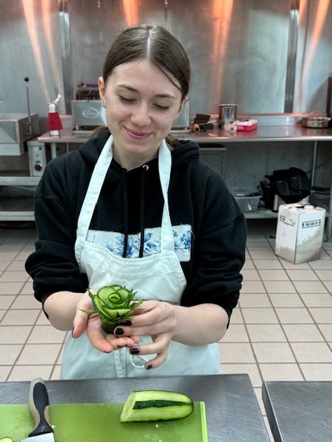 Students in Culinary 3 and 4 are sharpening their culinary artistry while learning garnishing and decorative food presentation. As part of the lesson, students practiced transforming cucumbers into delicate flower designs, building both knife skills and attention to detail. Activities like this help our Panthers understand that presentation is just as important as flavor in the culinary world while allowing them to showcase their creativity in the kitchen.