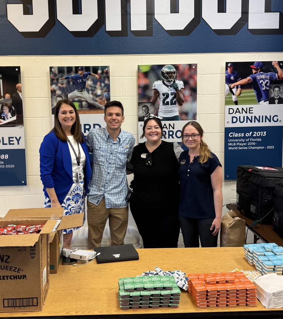 Mr. Mitchell and Dr. Halter with chick fil a 