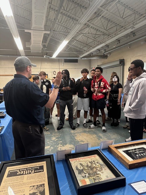 Our world history students had the opportunity to engage in a meaningful and impactful learning experience by exploring a traveling Holocaust cattle car exhibit and accompanying displays. Through scheduled small-group presentations in the cattle car, students experienced history in a powerful, personal way, while additional artifacts in the nearby classroom allowed for continued reflection and learning throughout the day. This experience helped bring their studies to life and deepened their understanding of the human impact of historical events.    A special thank you to Ms. Ryan, whose effort and coordination made this experience possible for our students. Because of her dedication, our students were able to connect classroom learning to real-world history in ways that foster empathy, awareness, and lasting perspective.