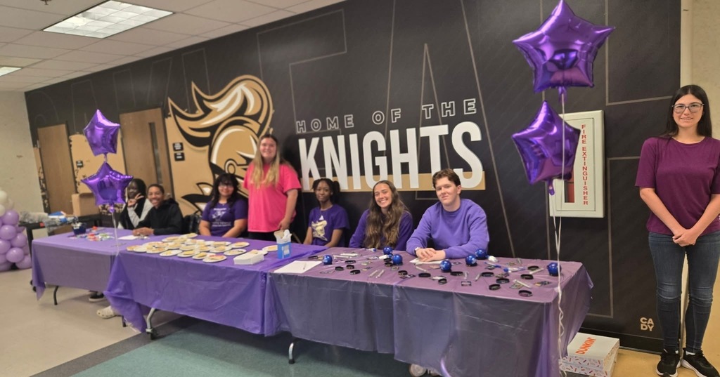 Staff and Students wearing purple to support military students.