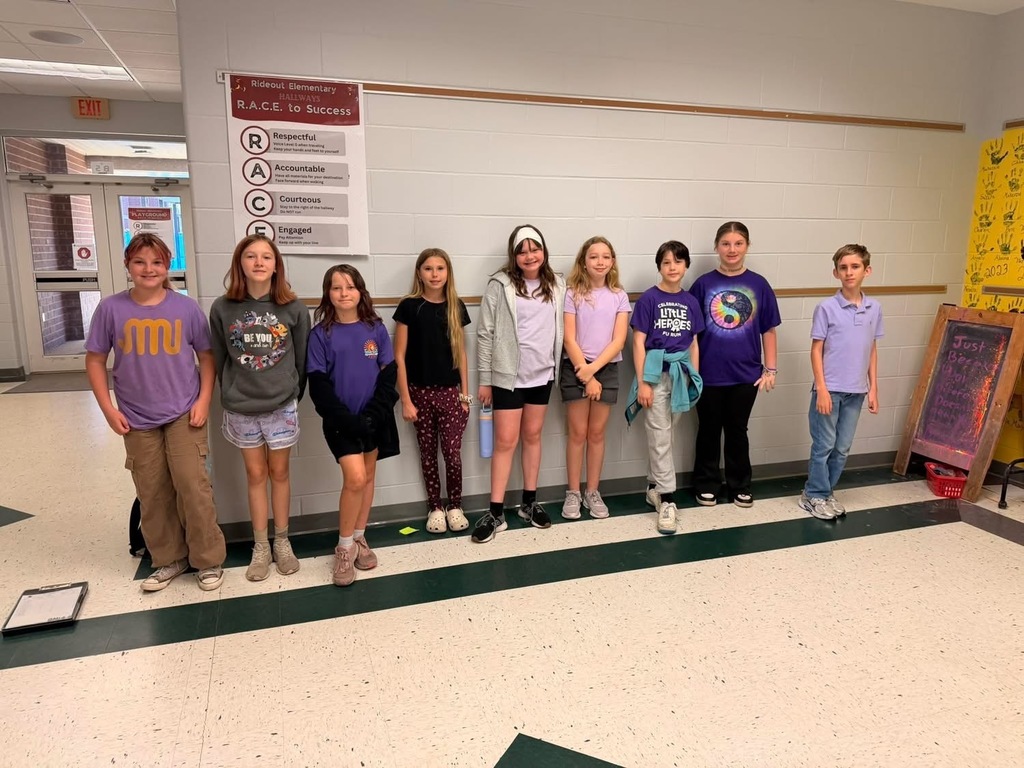 Staff and Students wearing purple to support military students.