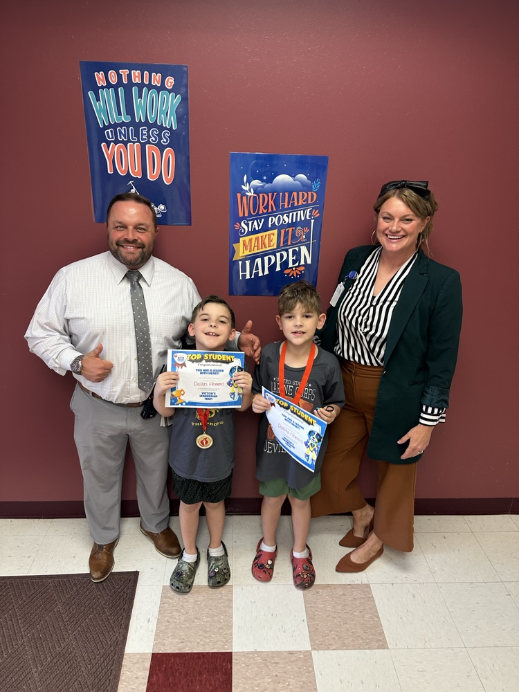 kids heart leaders with principals