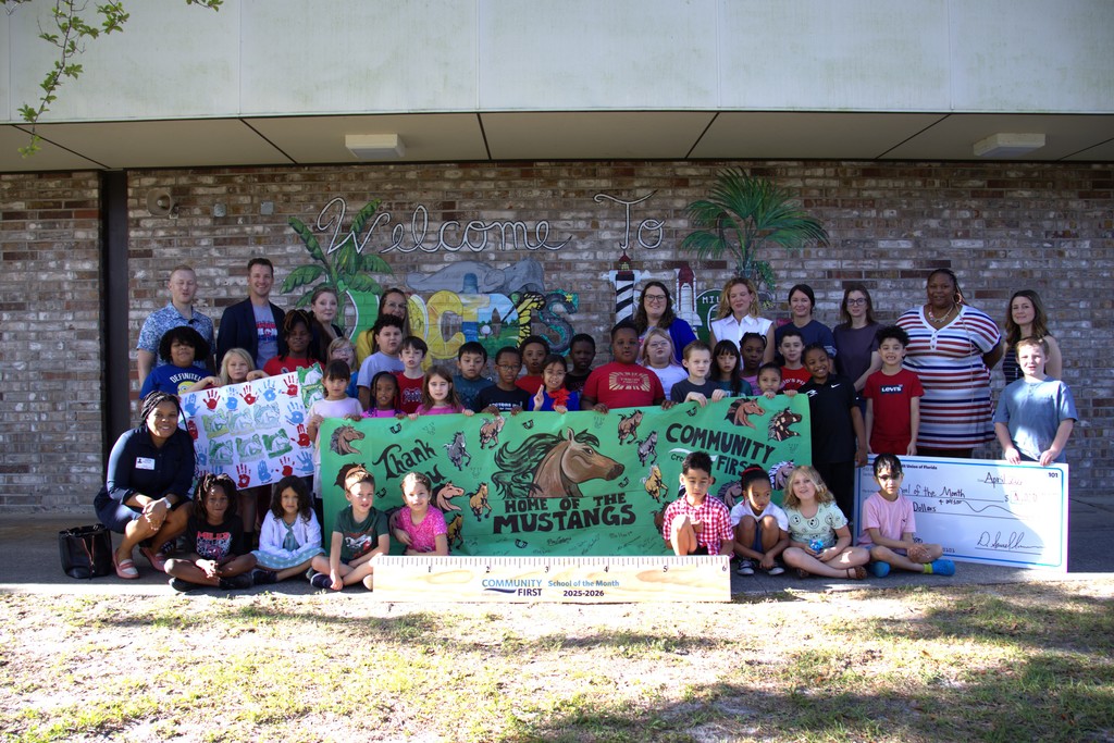 Group photo with banner