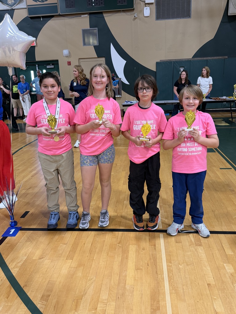 Students and Staff with Awards and Trophies