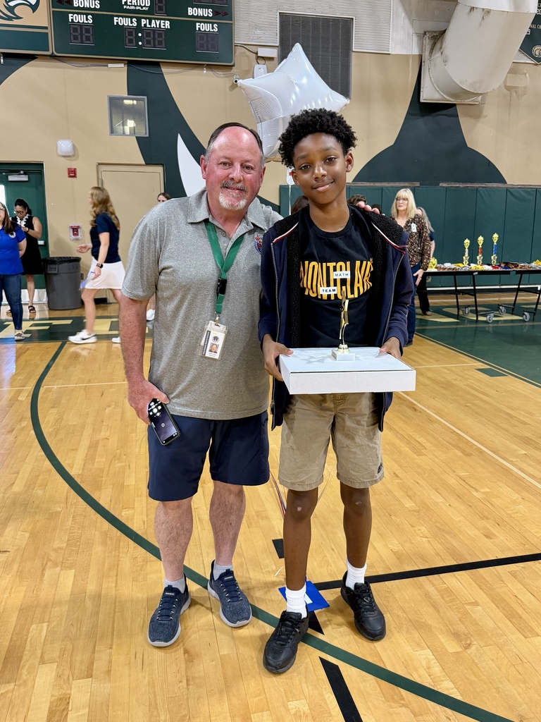 Students and Staff with Awards and Trophies