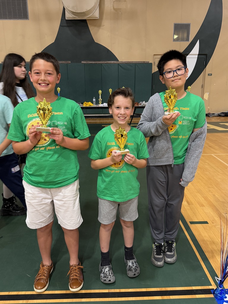 Students and Staff with Awards and Trophies