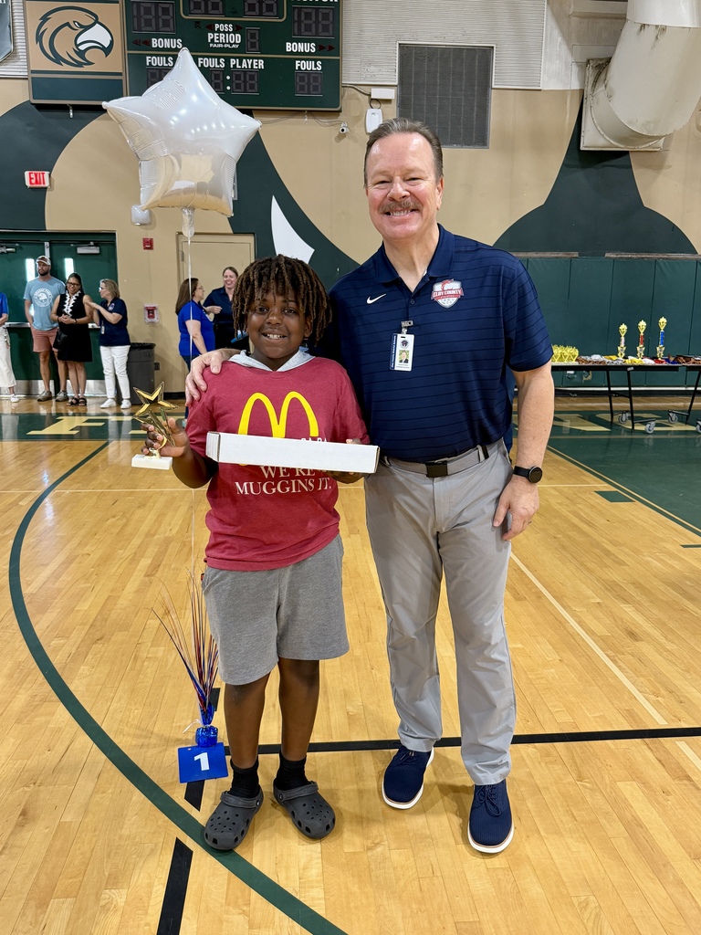 Students and Staff with Awards and Trophies