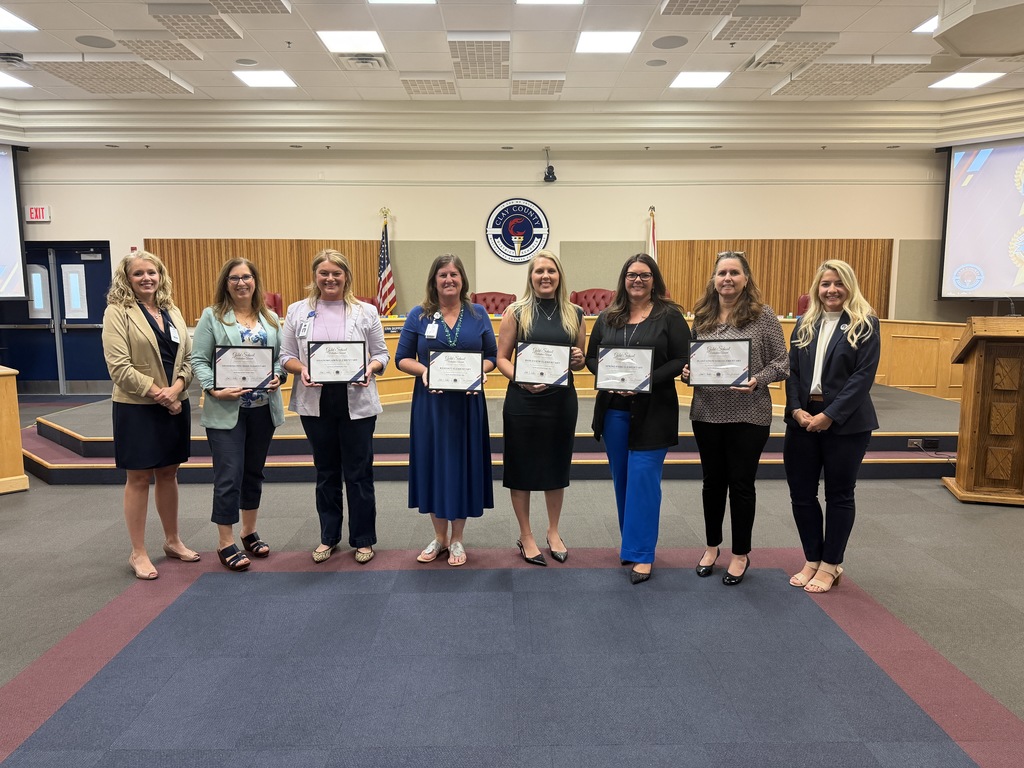 Principals With their awards for school volunteerism