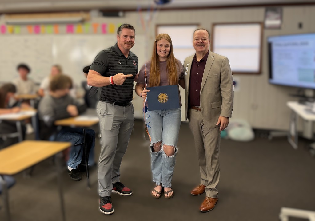 Student with Award and Staff