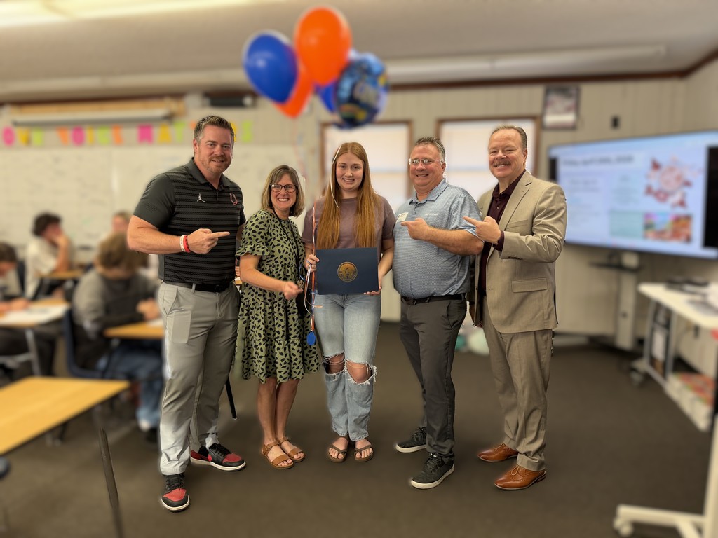 Student with Award and Family and Staff
