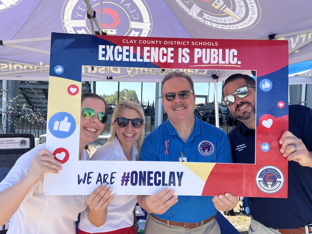 Excellence is Public sign with supporters