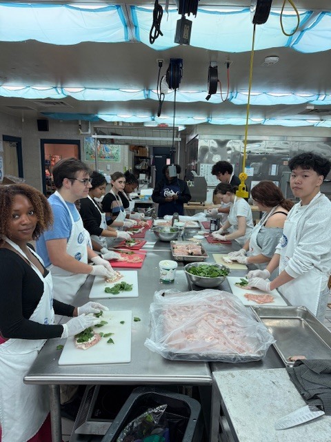 Recently, our Culinary students worked hard to prepare an incredible meal for the Clay Can Dance event. Students pounded out 250 pieces of chicken, and Mrs. Stevens’ 3rd period was a tremendous help during the preparation process while many students were away at Grad Bash.  The menu featured rolled chicken stuffed with spinach and Boursin cheese, Caprese skewers, salad, green beans, meatballs, bruschetta, molded butter, and mashed potatoes. A special thank you goes to Angelica, Mariah, and Sidney, who came in on Saturday to help finish the meal and prepare the mashed potatoes for pick up.  We are proud of the teamwork, dedication, and talent our students demonstrated, and we are so glad the guests enjoyed the meal.