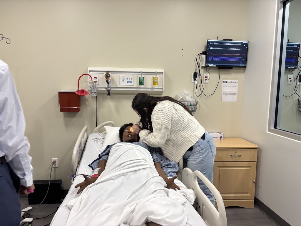 Our Health Science and HOSA students had a fantastic visit to the University of North Florida today. Faculty from the Brooks College of Health introduced students to the many degree programs available and shared valuable insight into careers in the healthcare field. Students also participated in a question and answer session with professors and senior nursing students, giving them a firsthand look at college life, coursework, and future opportunities. After the presentation, students enjoyed a guided walking tour of campus followed by lunch at the Osprey Café. The group then traveled to the MedNexus Simulation Lab at Deerwood, where they explored high fidelity mannequins used in medical training and practiced skills such as performing CPR, placing an NG tube, checking a pulse, and other hands on activities. It was an incredible experience that allowed students to see the pathways and possibilities waiting for them after high school.