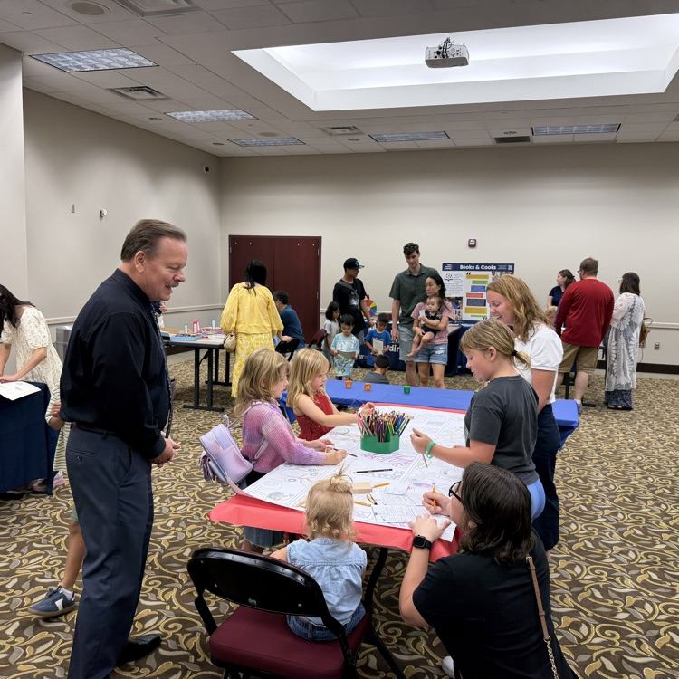 students enjoying the family engagement art room