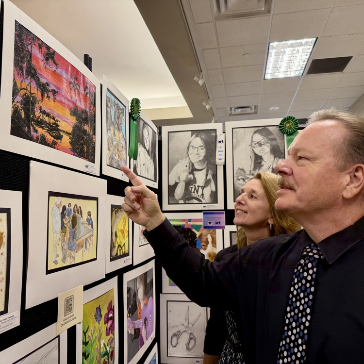 Superintendent Broskie admiring the art