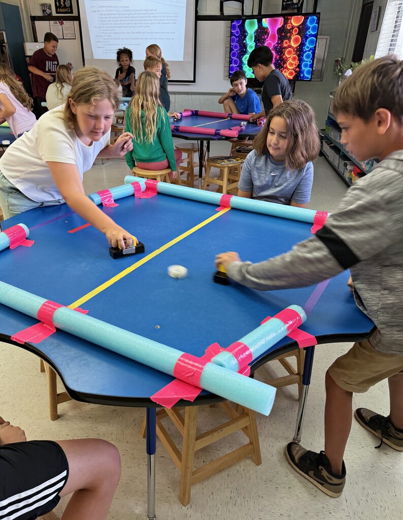 Game on in the STEM Lab! 🏒⚡  This week, our STEM Resource classes are diving into STEM Table Hockey Week! Our amazing teacher, Stephanie, just designed a brand-new lab that has students completely hooked. They are building, testing, and competing—learning core STEM concepts while having an absolute blast.  When a lesson hits that perfect sweet spot of high energy and deep learning, all we can say is... thank goodness! 🙌  Check out our future engineers and NHL stars in action! 👇  #STEMEducation #HandsOnLearning #TableHockey
