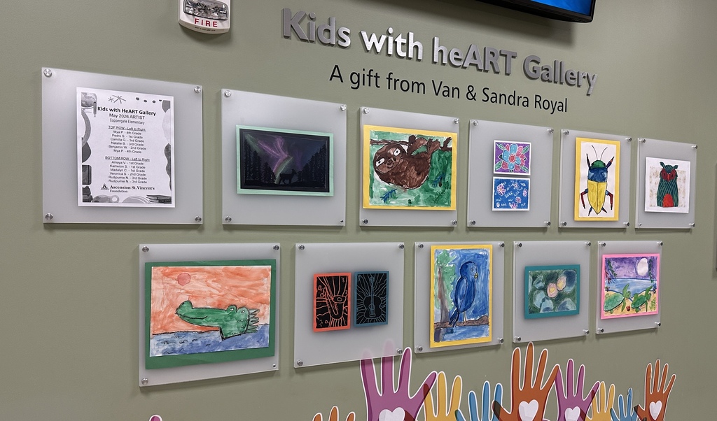A wall with a gallery titled "Kids with heart Gallery" features numerous colorful children's paintings.