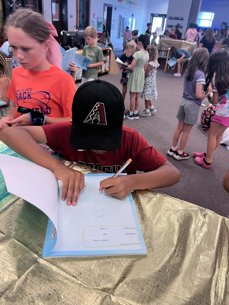 Yearbook signing party yesterday was so fun! Kidlets got to pick up this year's yearbook and have buddies sign it! If you still want a yearbook, before we run out be sure to go to MySchoolBucks lickety split