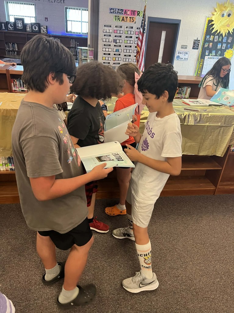 Yearbook signing party yesterday was so fun! Kidlets got to pick up this year's yearbook and have buddies sign it! If you still want a yearbook, before we run out be sure to go to MySchoolBucks lickety split