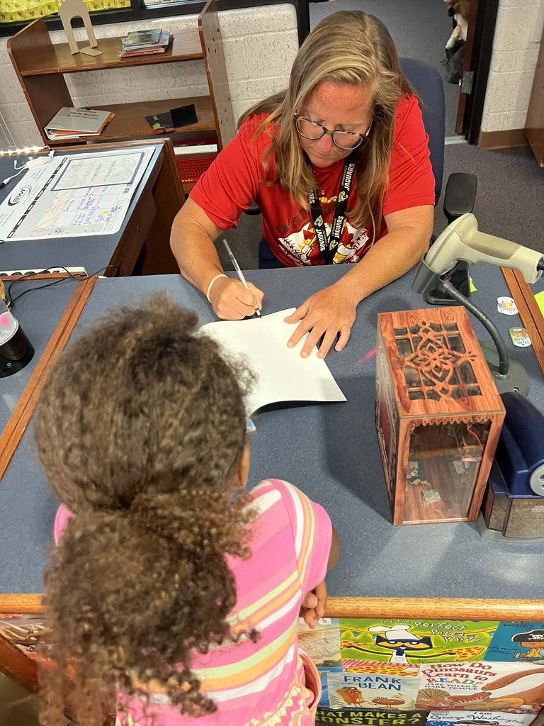 Yearbook signing party yesterday was so fun! Kidlets got to pick up this year's yearbook and have buddies sign it! If you still want a yearbook, before we run out be sure to go to MySchoolBucks lickety split