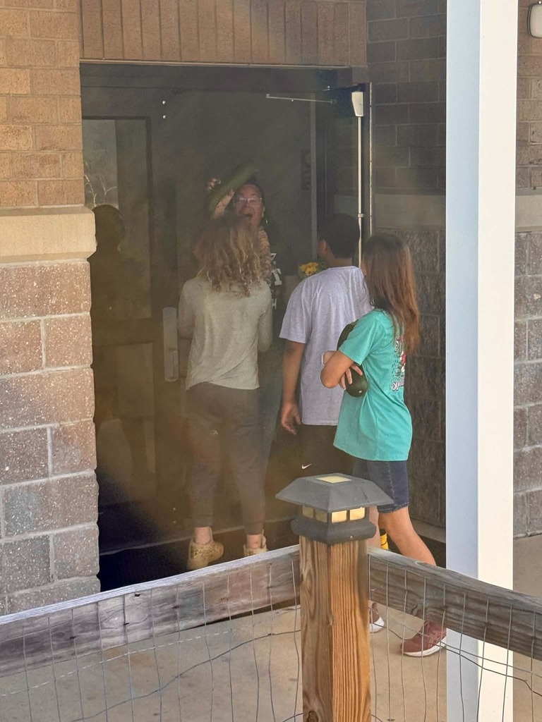 🥒🥗UE Veggie Garden🥗🥒 What a harvest from our UE vegetable garden! They picked some great huge zucchini and lots of lettuce. They gifted the biggest one to Mrs. Dryden as a surprise!