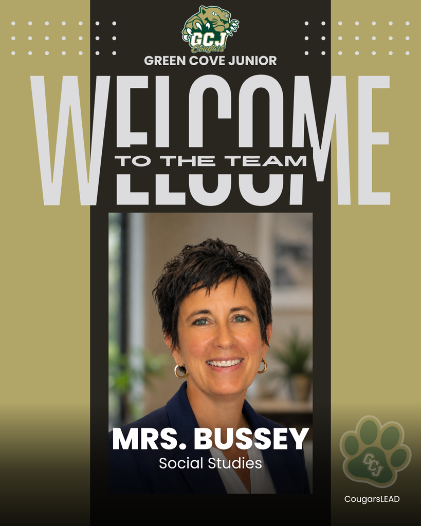 A poster reads "Welcome to the Team Mrs. Bussey Social Studies" with a picture of a woman with short hair and a smile.