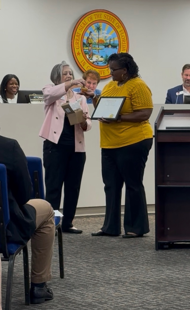 Mrs. Bailey being recognized