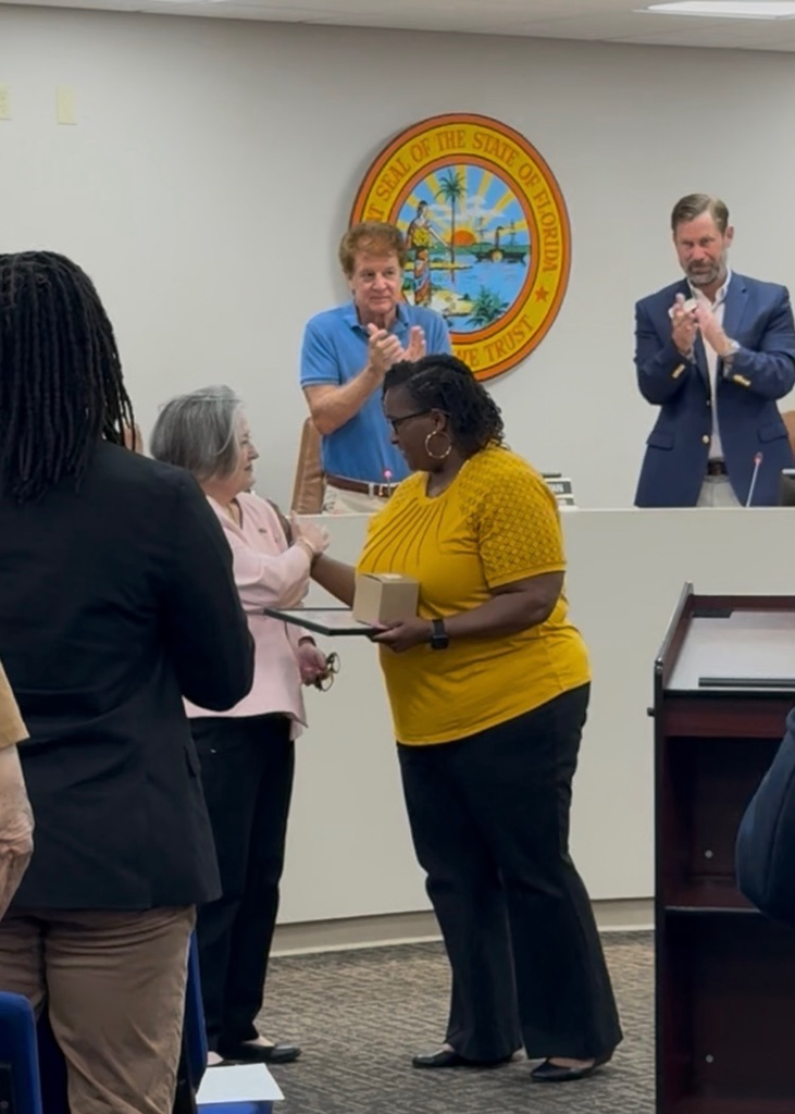 Mrs. Bailey being recognized