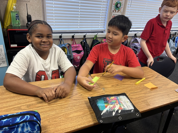 students in Mrs. Myers class working on a writing project