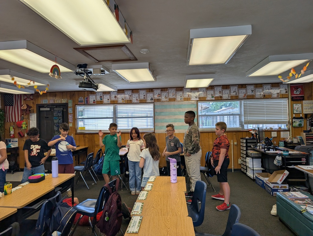 students working together to get into an organized line
