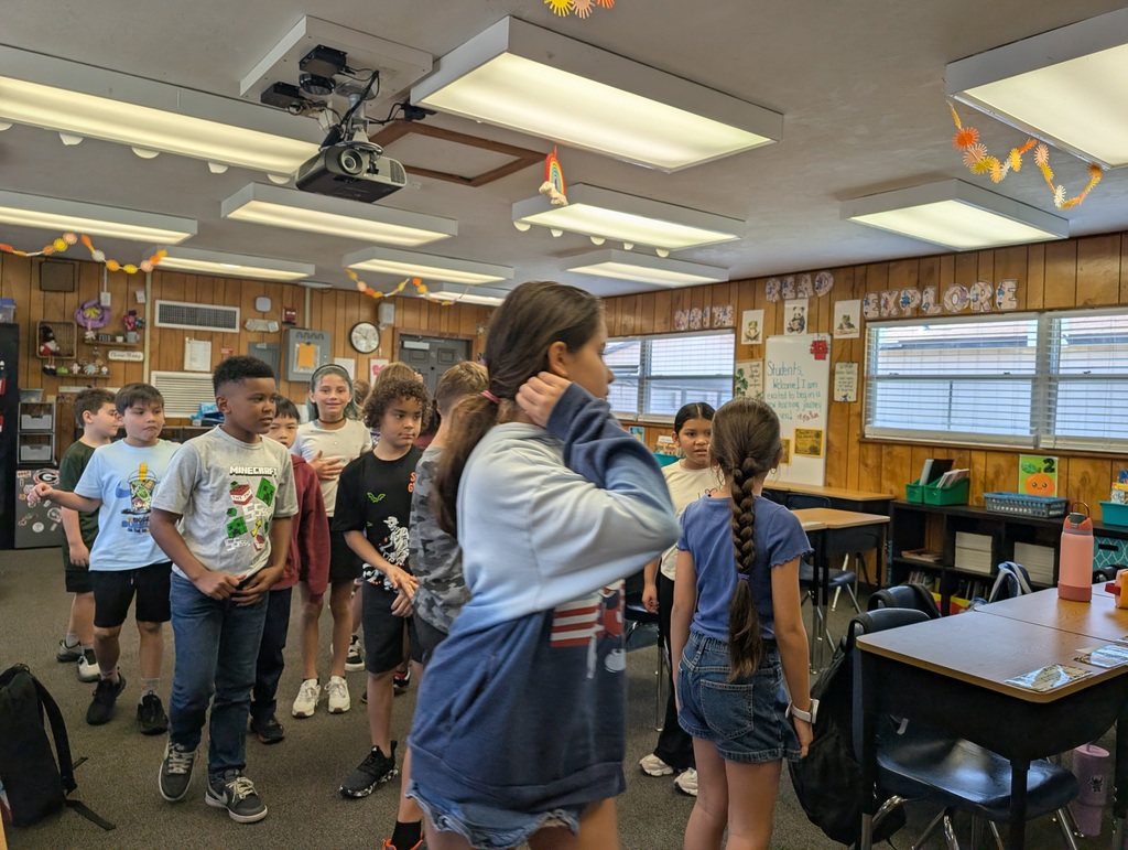 students working together to get into an organized line