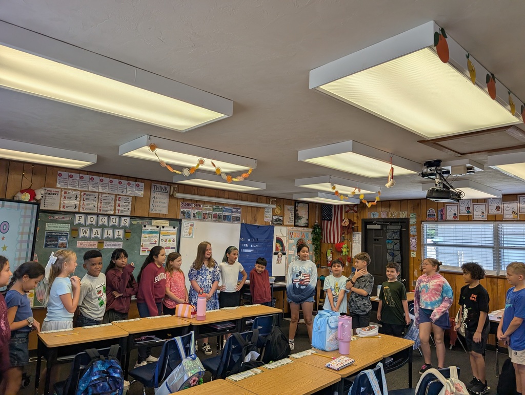 students working together to get into an organized line