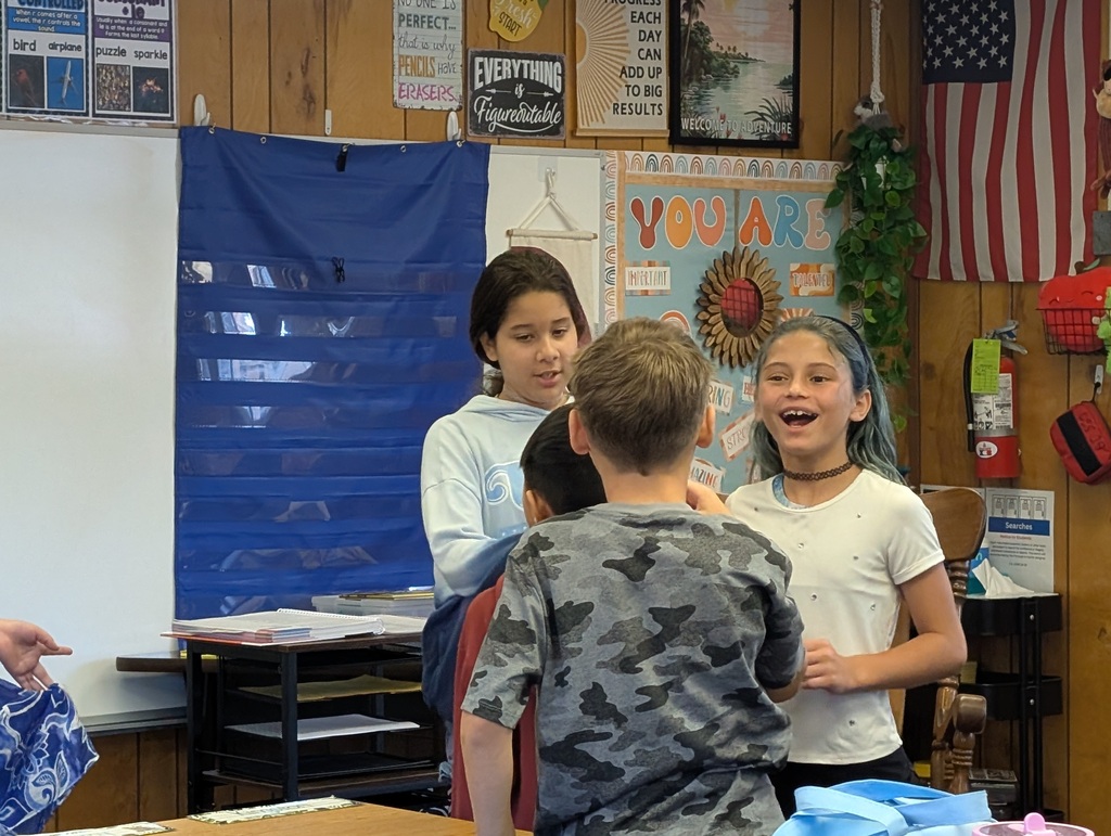 students working together to get into an organized line