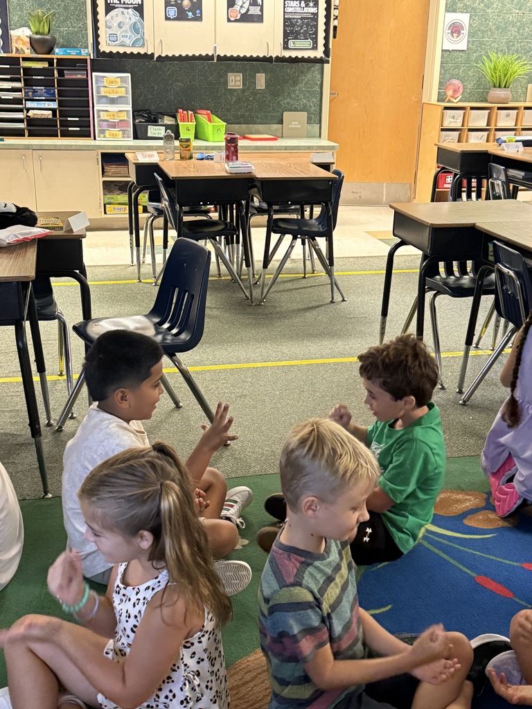 2nd Grade: practicing our turn and talk procedures as well as our addition facts.