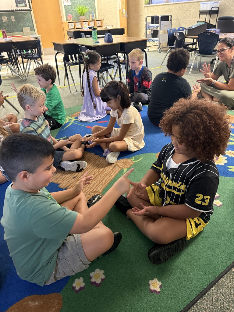 2nd Grade: practicing our turn and talk procedures as well as our addition facts.