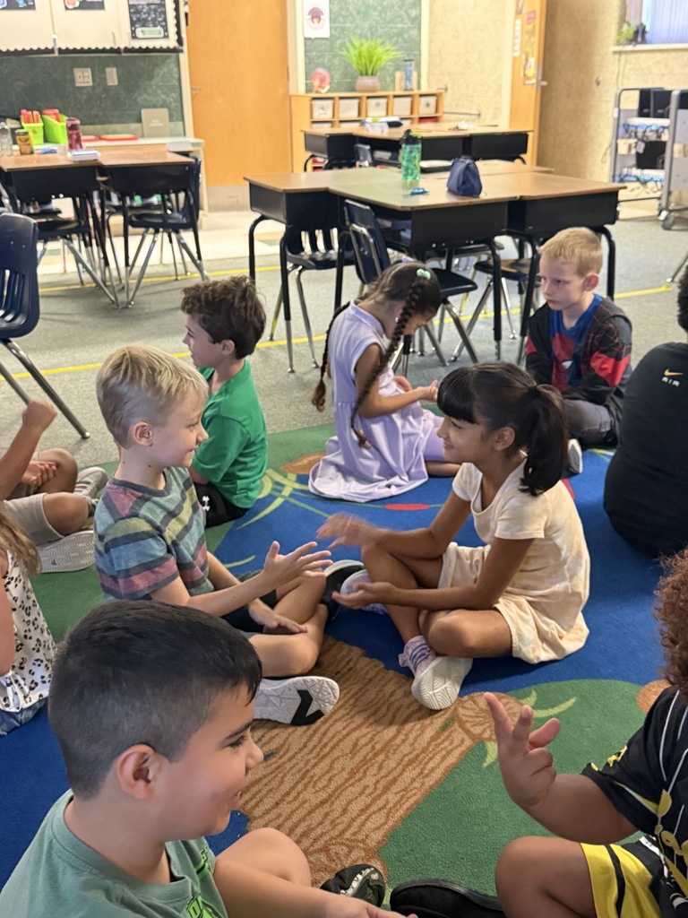 2nd Grade: practicing our turn and talk procedures as well as our addition facts.