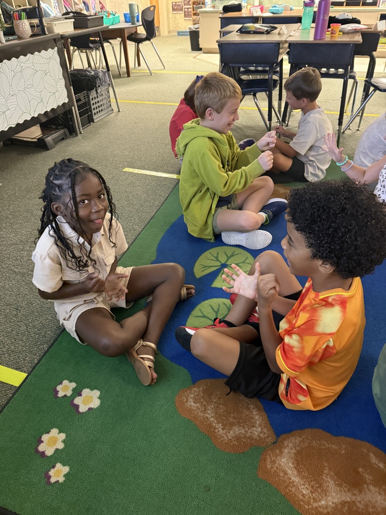 2nd Grade: practicing our turn and talk procedures as well as our addition facts.