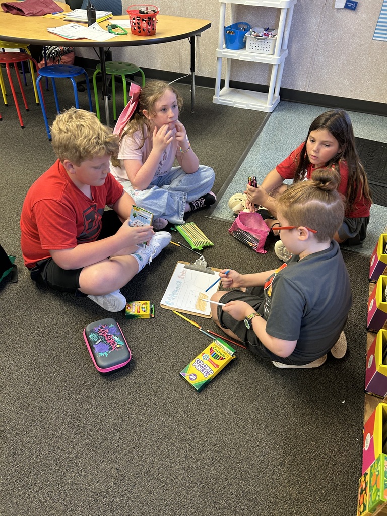 students presenting information to their class