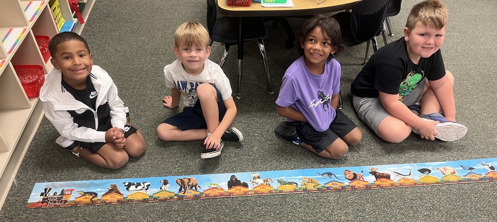 students playing on the floor