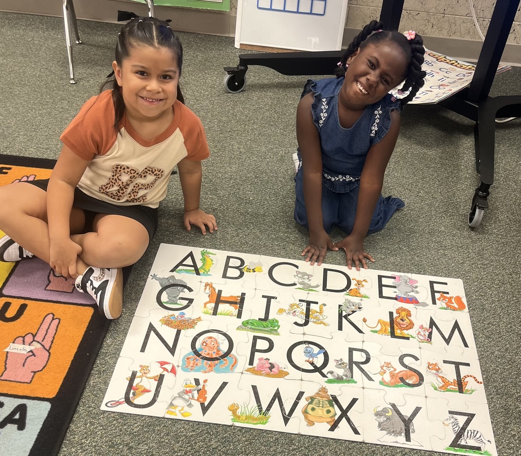 students playing on the floor